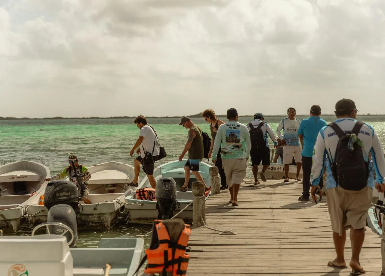 Boats and lifejackets at the wooden dock, Muyil, Tulum