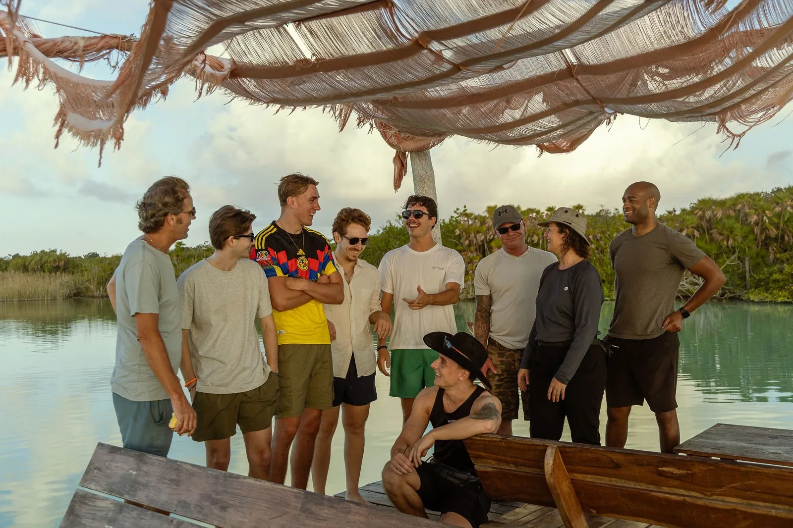 Group relaxing under a palapa shelter after the tour